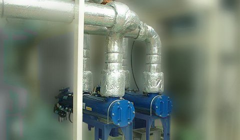 化学工場におけるプラスチック成型押出冷却ラインの冷却循環水に混入しているPVC切削カス及び珪藻類等の異物除去